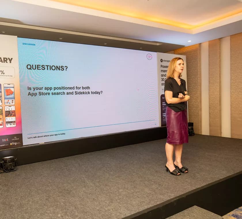 Speaker presenting an app growth session at Shop Quest 2026