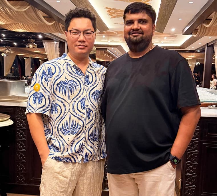 CartCoders specialists discussing a Shopify roadmap with a merchant